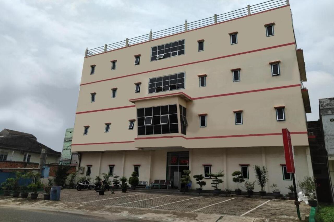Oyo 3499 J8 Hotel Jambi Bagian luar foto